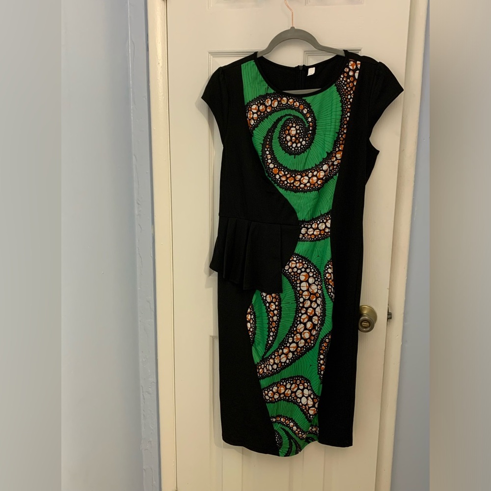 This is a BRAND NEW bodycon tribal print dress! Never worn!